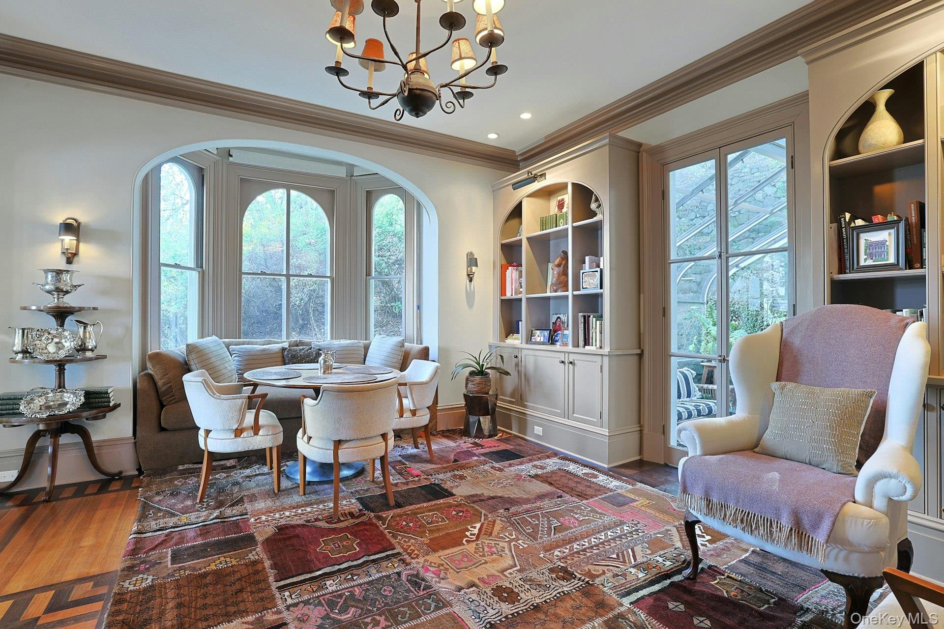 216-217 River Road Nyack, NY 10960 - Photo 24 of 50 a dining room with furniture a rug and a large window