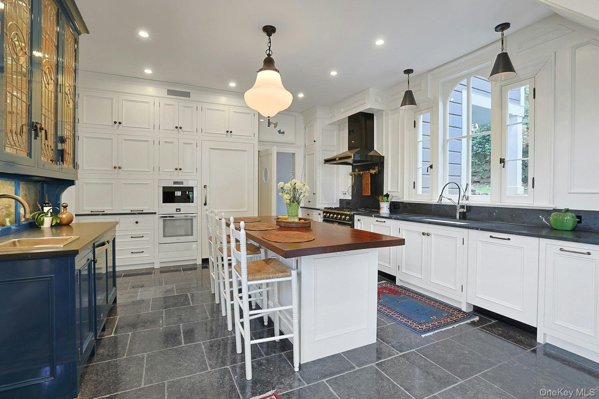 216-217 River Road Nyack, NY 10960 - Photo 29 of 50 a kitchen with stainless steel appliances kitchen island granite countertop a sink and cabinets