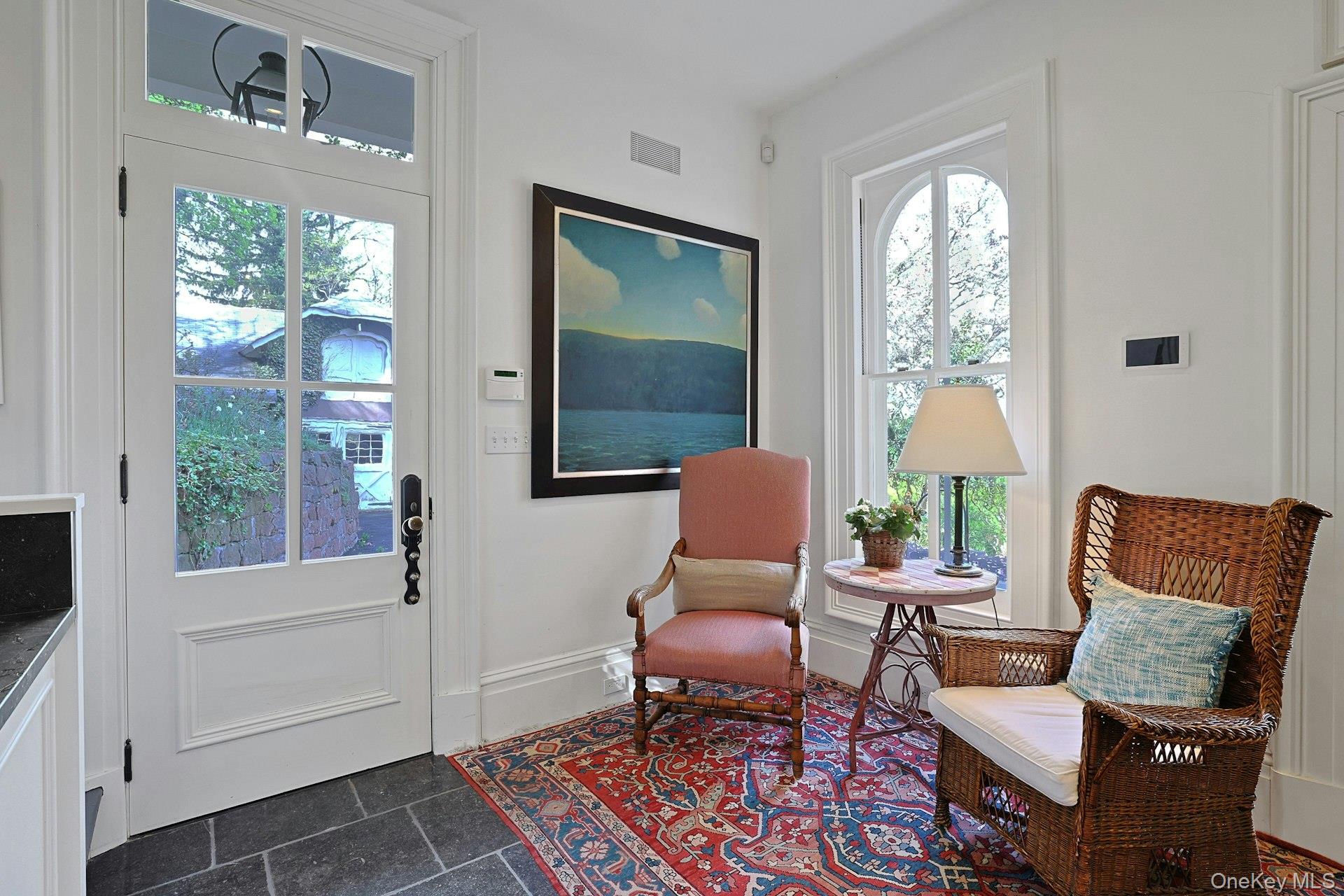 216-217 River Road Nyack, NY 10960 - Photo 30 of 50 a living room with furniture and a window