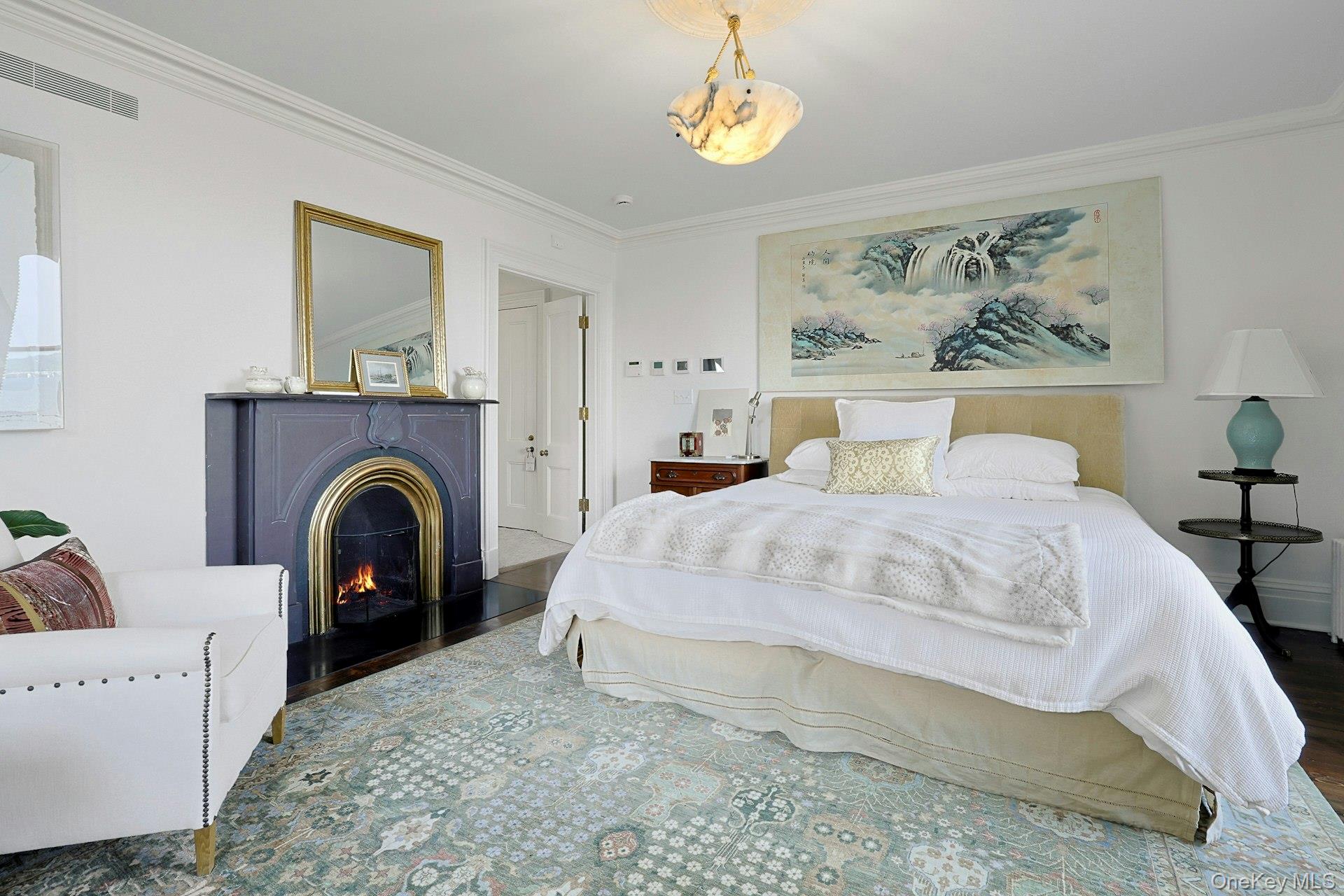216-217 River Road Nyack, NY 10960 - Photo 32 of 50 a bed room with a bed and a fireplace