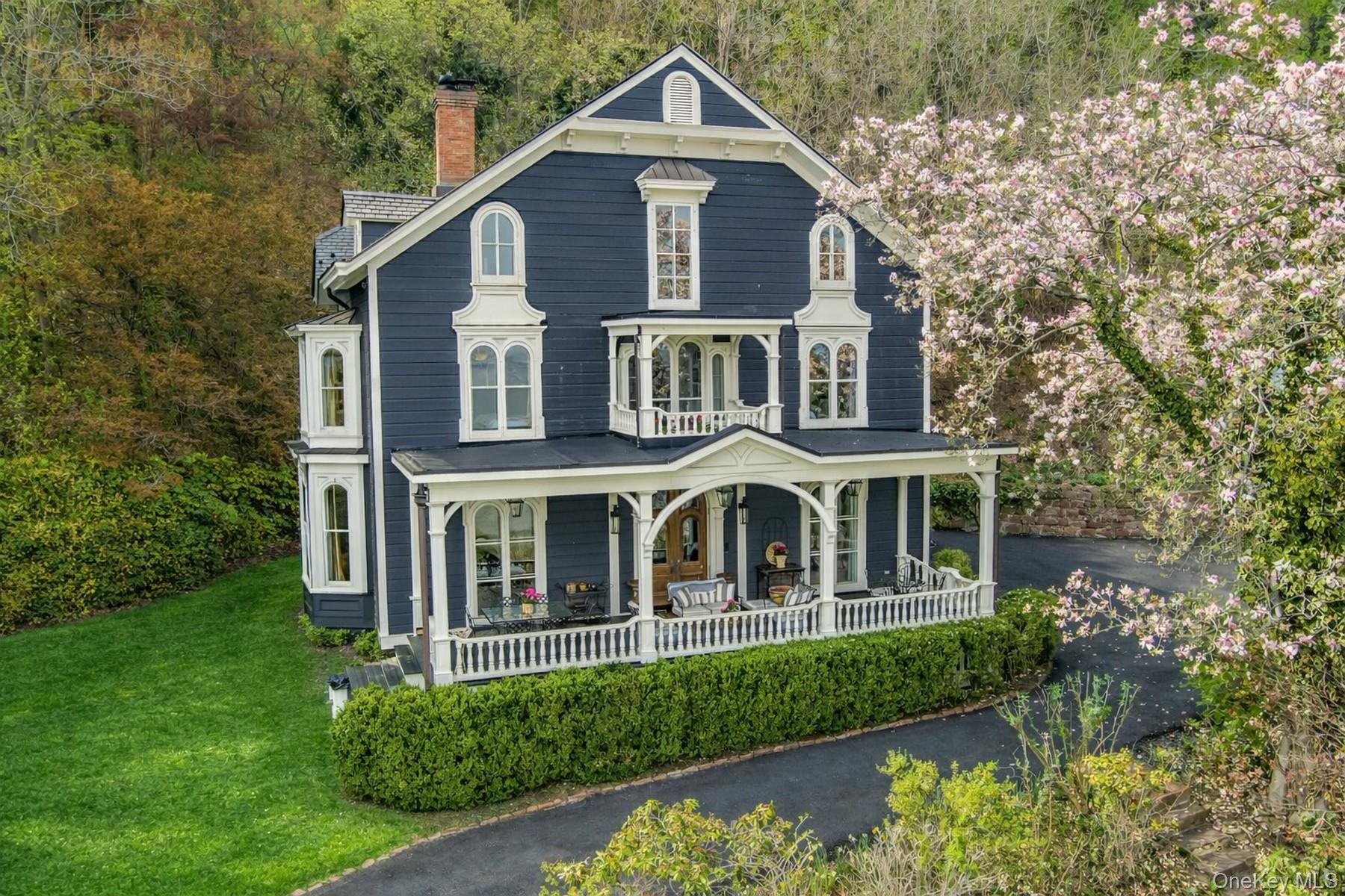 216-217 River Road Nyack, NY 10960 - Photo 4 of 50 a front view of a house with a yard