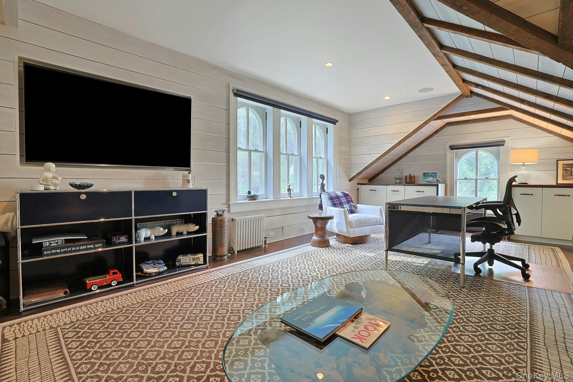 216-217 River Road Nyack, NY 10960 - Photo 45 of 50 a living room with furniture and a flat screen tv