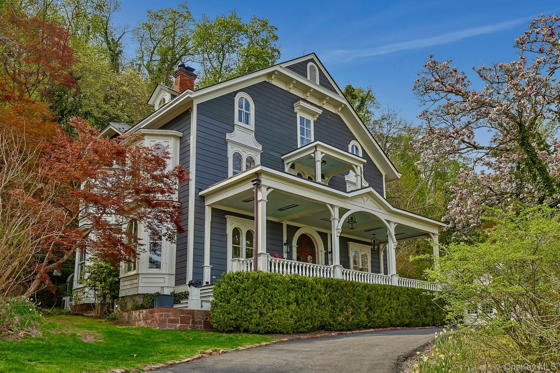216-217 River Road Nyack, NY 10960 - Photo 49 of 50 a front view of a house with a yard