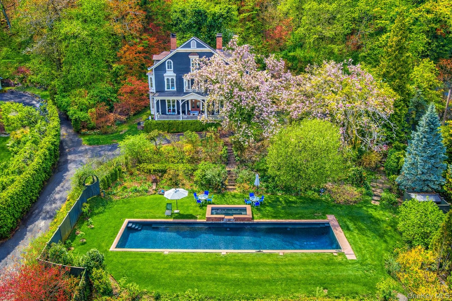 216-217 River Road Nyack, NY 10960 - Photo 5 of 50 a view of a yard with plants and large trees