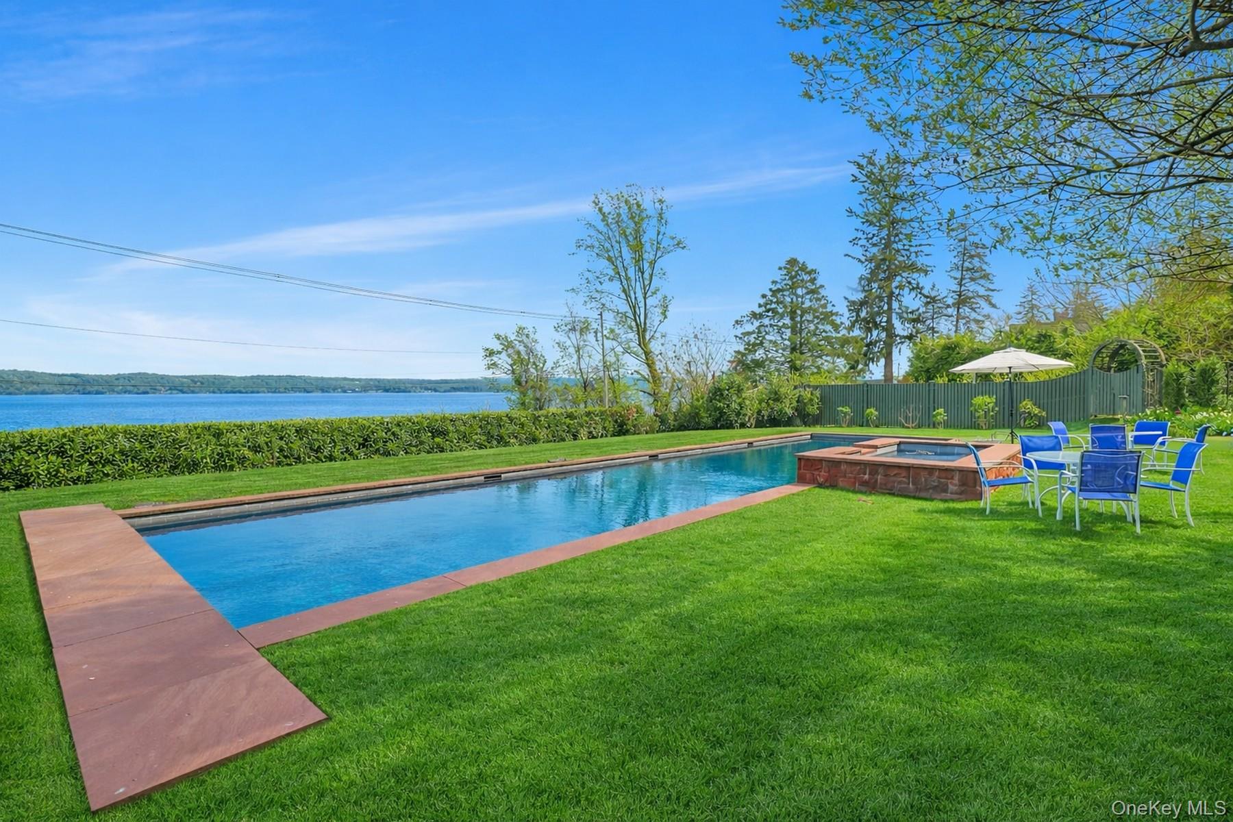 216-217 River Road Nyack, NY 10960 - Photo 9 of 50 a view of yard with swimming pool and green space