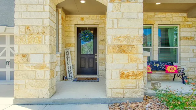 a view of a entryway with flower pots