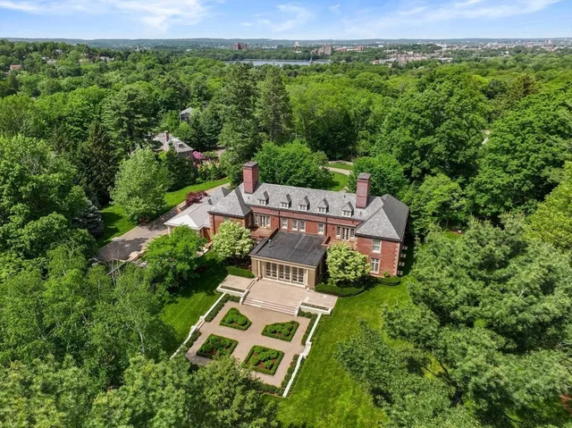 an aerial view of a house with a garden