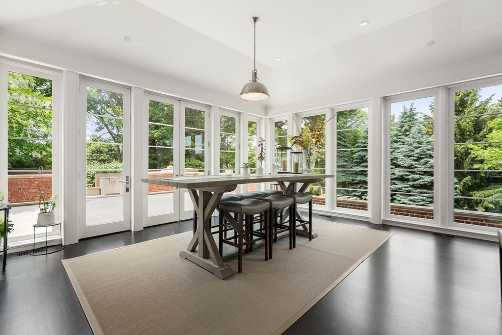 1014 Boylston Street Brookline, MA 02467 - Photo 18 of 38 a dining room with furniture window wooden floor