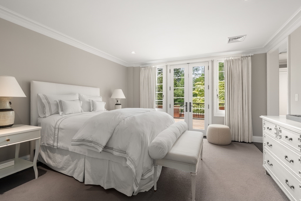 1014 Boylston Street Brookline, MA 02467 - Photo 26 of 38 a bedroom with a bed and a window