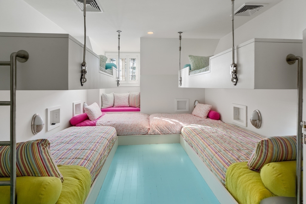 1014 Boylston Street Brookline, MA 02467 - Photo 29 of 38 a bedroom with a bed and a couch