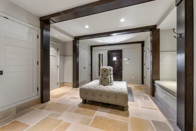 a en suite bathroom with a double vanity sink and a mirror