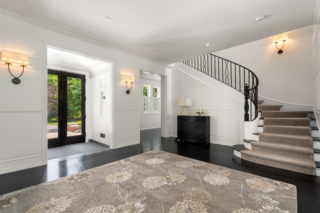 1014 Boylston Street Brookline, MA 02467 - Photo 7 of 38 a view of entryway and hall with wooden floor