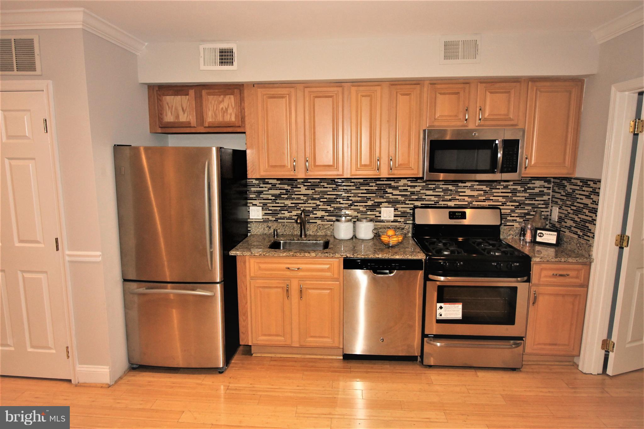 1917 Rosedale Street Northeast, Unit 2 Washington, DC 20002 - Photo 8 of 14 Kitchen with Granite Counters