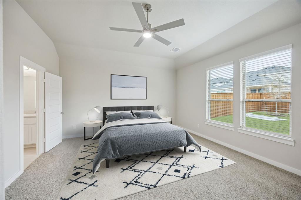 2109 Sunshining Road Princeton, TX 75407 - Photo 17 of 35 Primary Suite in the Stanley II home plan by Trophy Signature Homes – REPRESENTATIVE PHOTO