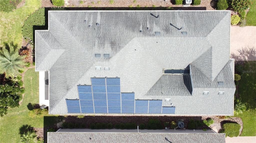 277 Silver Maple Road Groveland, FL 34736 - Photo 54 of 81 a front view of a house with a yard