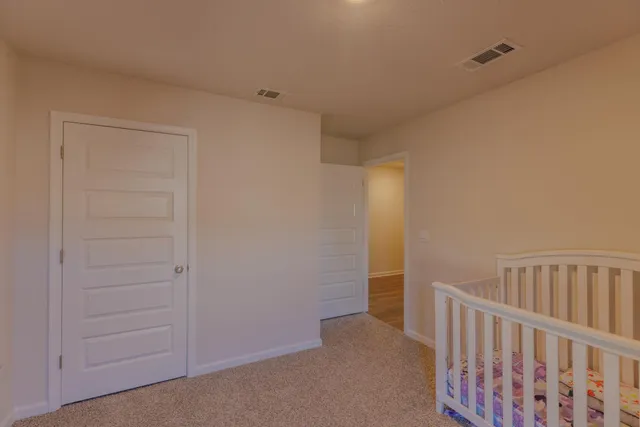 a view of kitchen and wooden floor