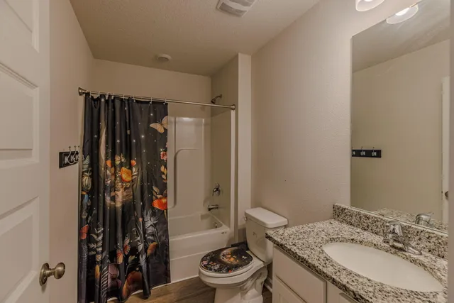 a view of workspace with furniture and window