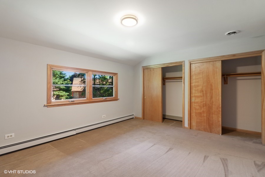 399 Audubon Road Riverside, IL 60546 - Photo 22 of 31 an empty room with windows