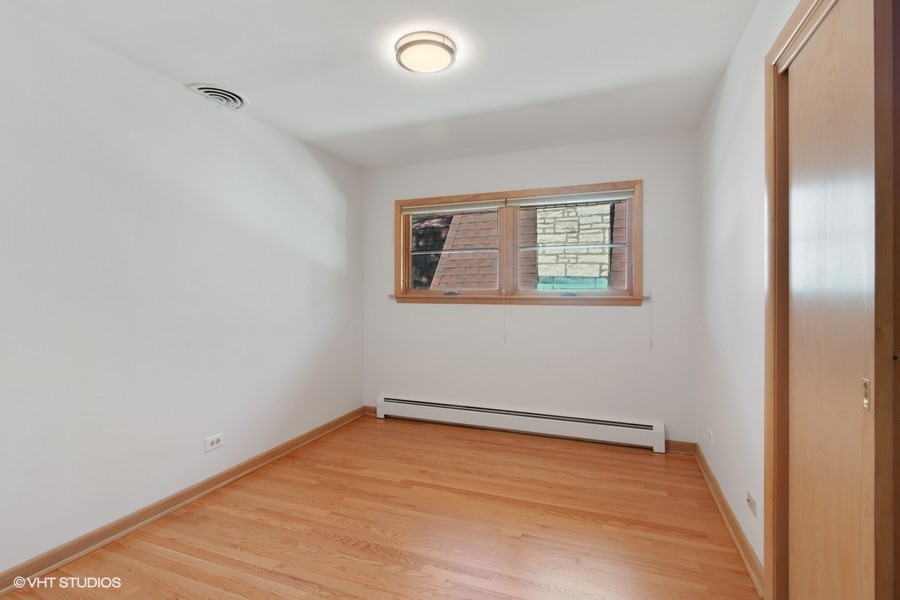 399 Audubon Road Riverside, IL 60546 - Photo 25 of 31 an empty room with a workbench