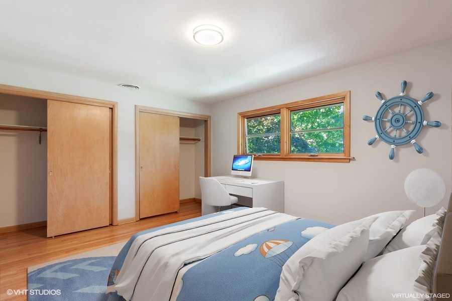 399 Audubon Road Riverside, IL 60546 - Photo 26 of 31 a bedroom with a bed and a window