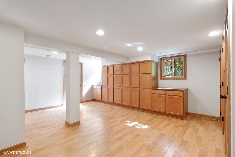 399 Audubon Road Riverside, IL 60546 - Photo 27 of 31 a view of an empty room with a kitchen
