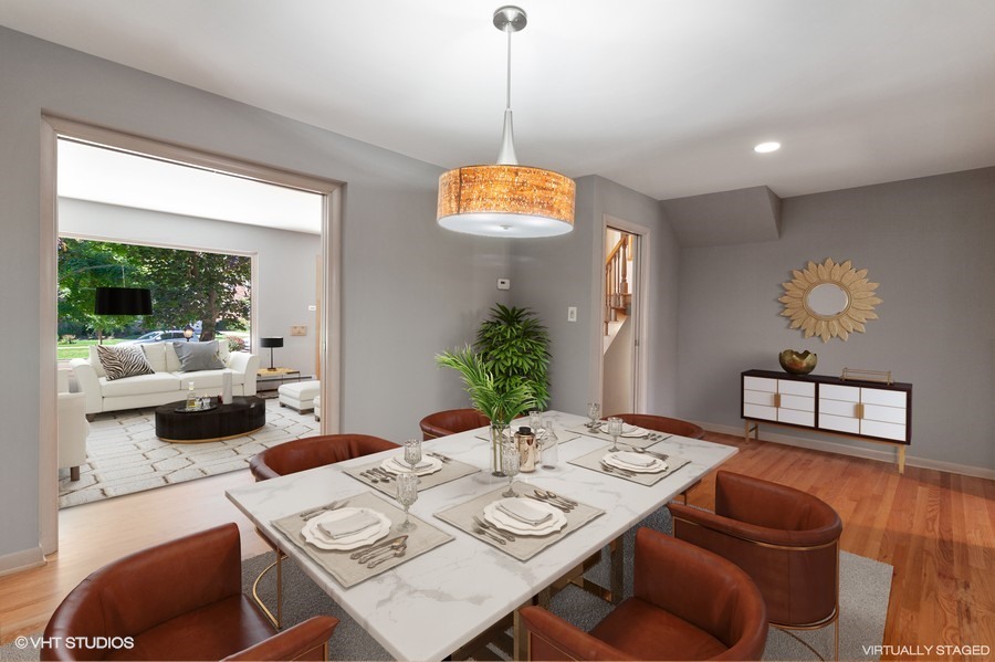 399 Audubon Road Riverside, IL 60546 - Photo 6 of 31 a view of a dining room with furniture window and outside view