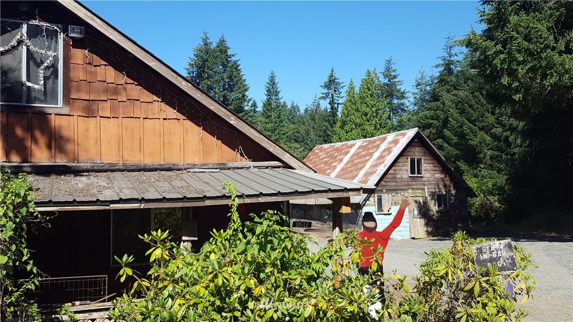 1499 King Road Winlock, WA 98596 - Photo 2 of 16 a view of small house with yard and sitting area