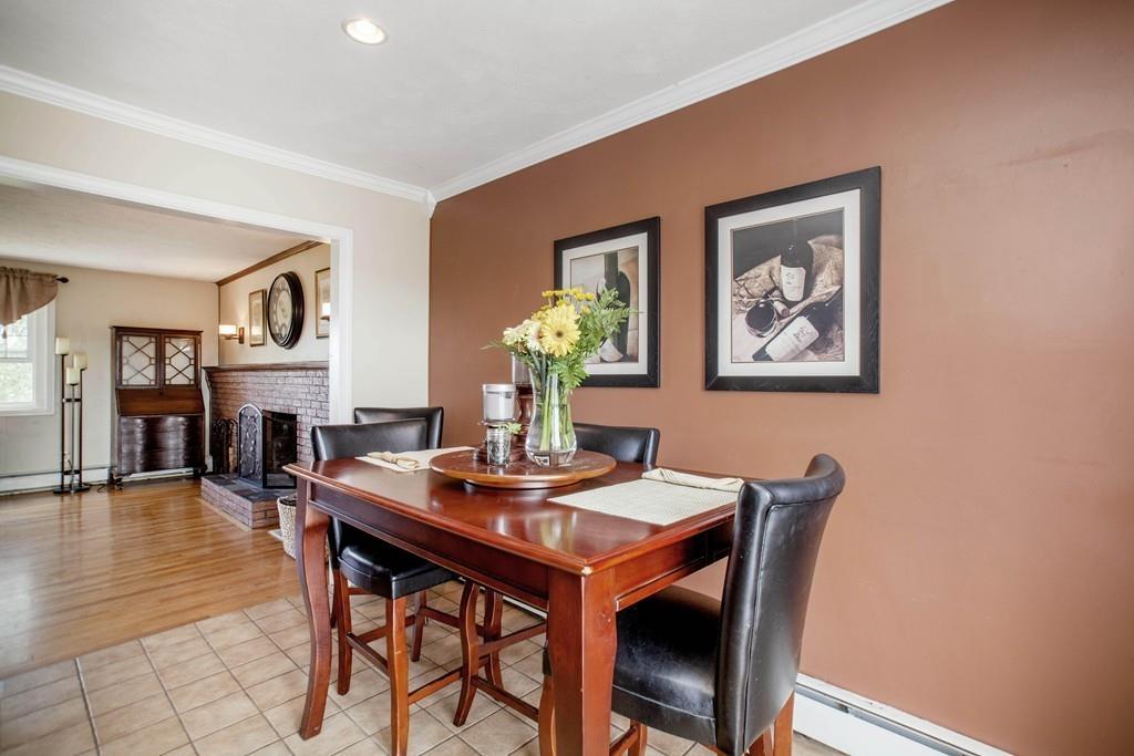 44 Dolan Road Millbury, MA 01527 - Photo 11 of 40 a dining room with furniture and wooden floor