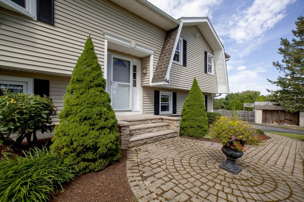 44 Dolan Road Millbury, MA 01527 - Photo 2 of 40 a front view of a house with garden