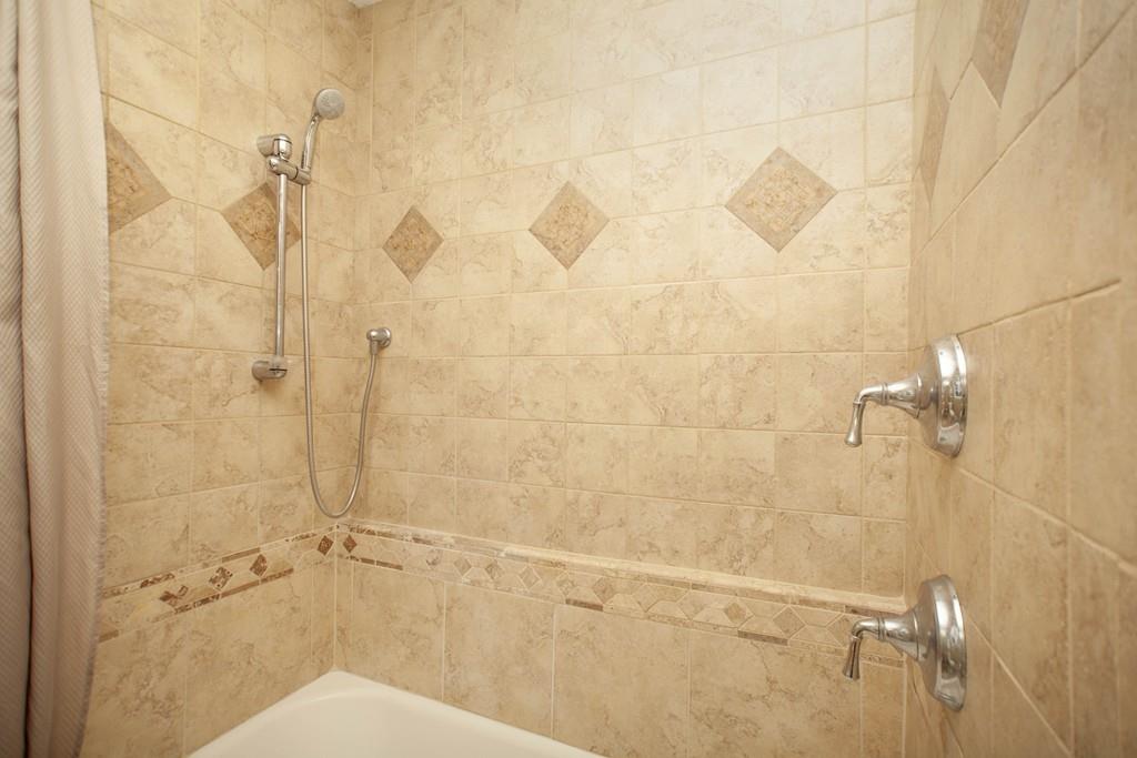 44 Dolan Road Millbury, MA 01527 - Photo 25 of 40 a bathroom with a shower and a toilet