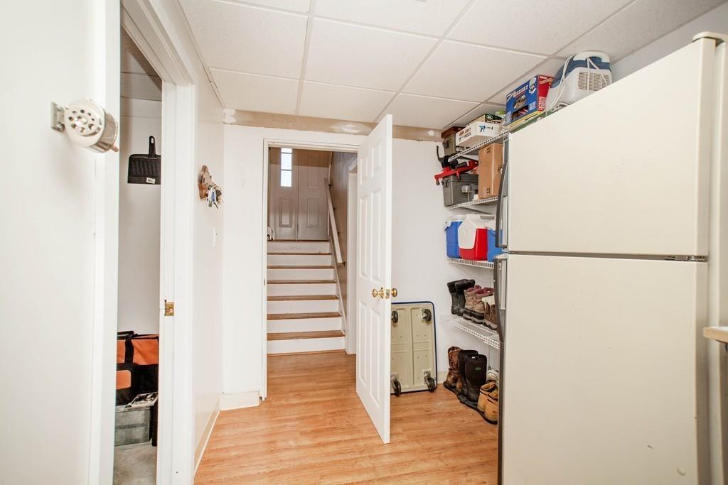 44 Dolan Road Millbury, MA 01527 - Photo 33 of 40 a view of a hallway with wooden floor and entryway