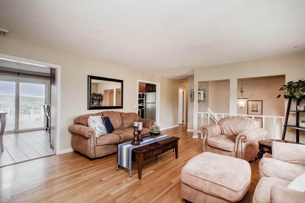 44 Dolan Road Millbury, MA 01527 - Photo 4 of 40 a living room with furniture and a large window