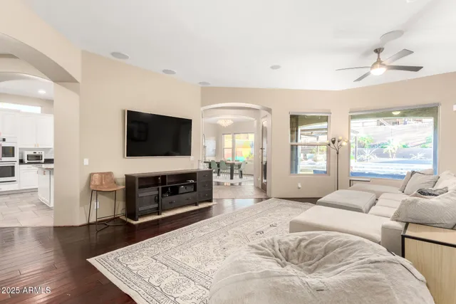 a kitchen with stainless steel appliances kitchen island granite countertop a sink and cabinets