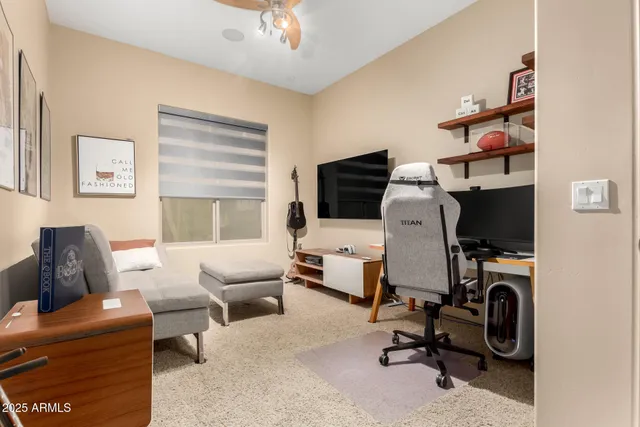 an aerial view of residential houses and outdoor space