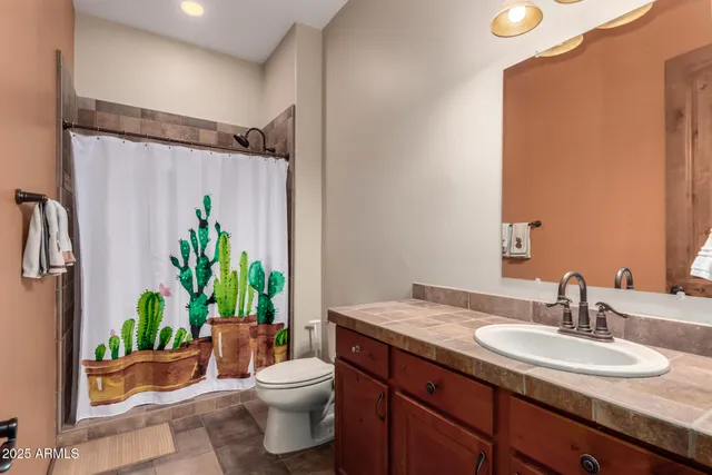 an aerial view of residential houses and city view