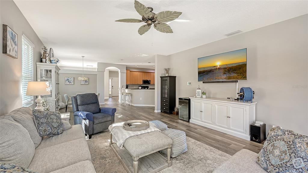 12274 23rd Street East Parrish, FL 34219 - Photo 11 of 64 a living room with furniture and a flat screen tv