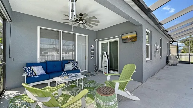 a view of a swimming pool with a patio