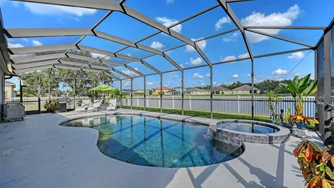 a view of a swimming pool with a porch
