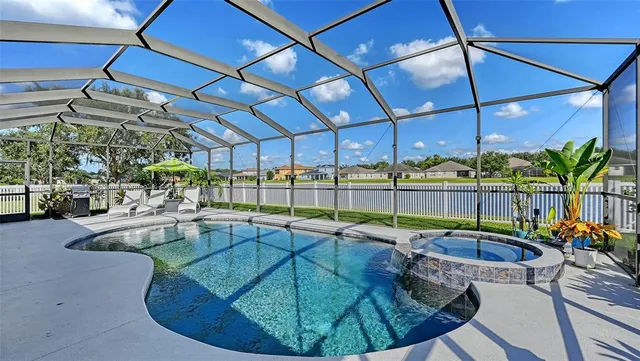a view of a living room and chandelier