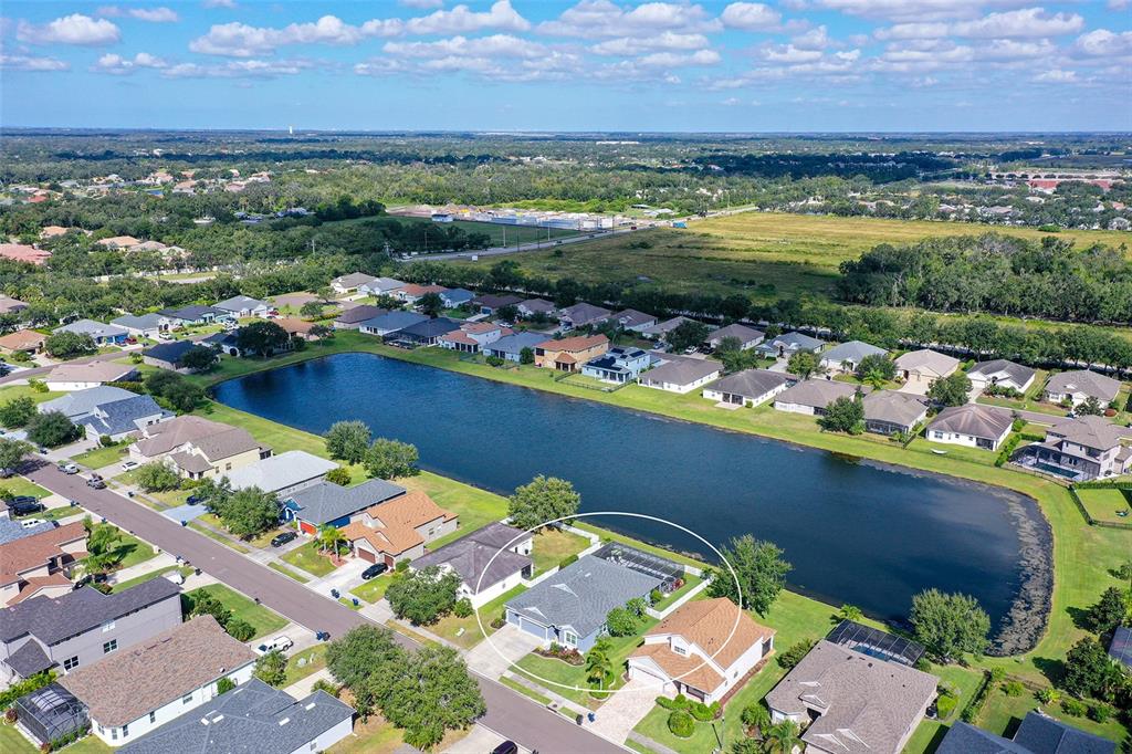 12274 23rd Street East Parrish, FL 34219 - Photo 64 of 64 an aerial view of a residential houses with outdoor space