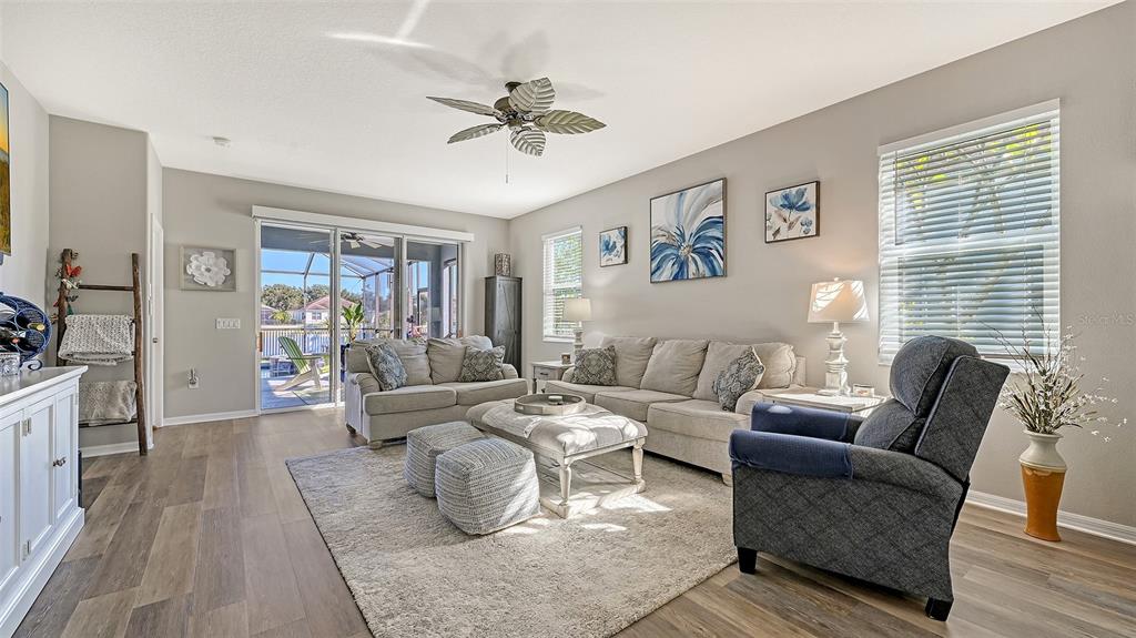 12274 23rd Street East Parrish, FL 34219 - Photo 8 of 64 a living room with furniture and a large window