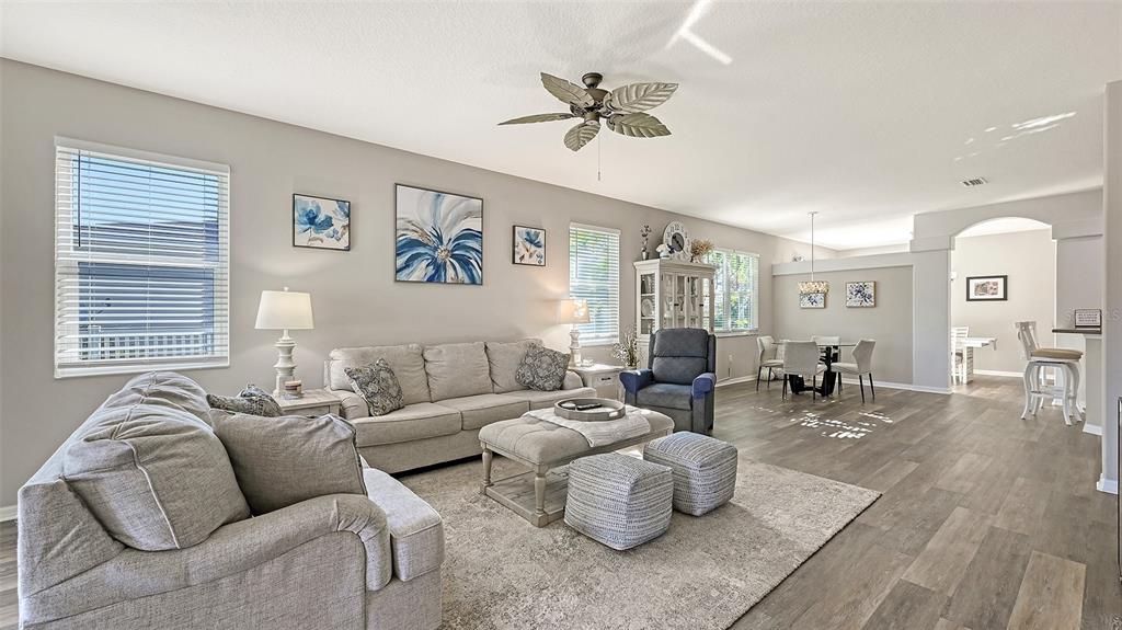 12274 23rd Street East Parrish, FL 34219 - Photo 10 of 64 a living room with furniture and a large window