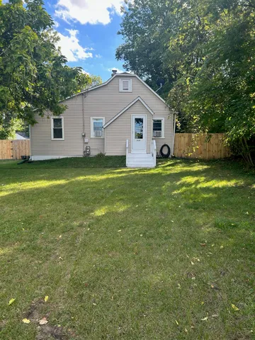 a view of a yard in front of house