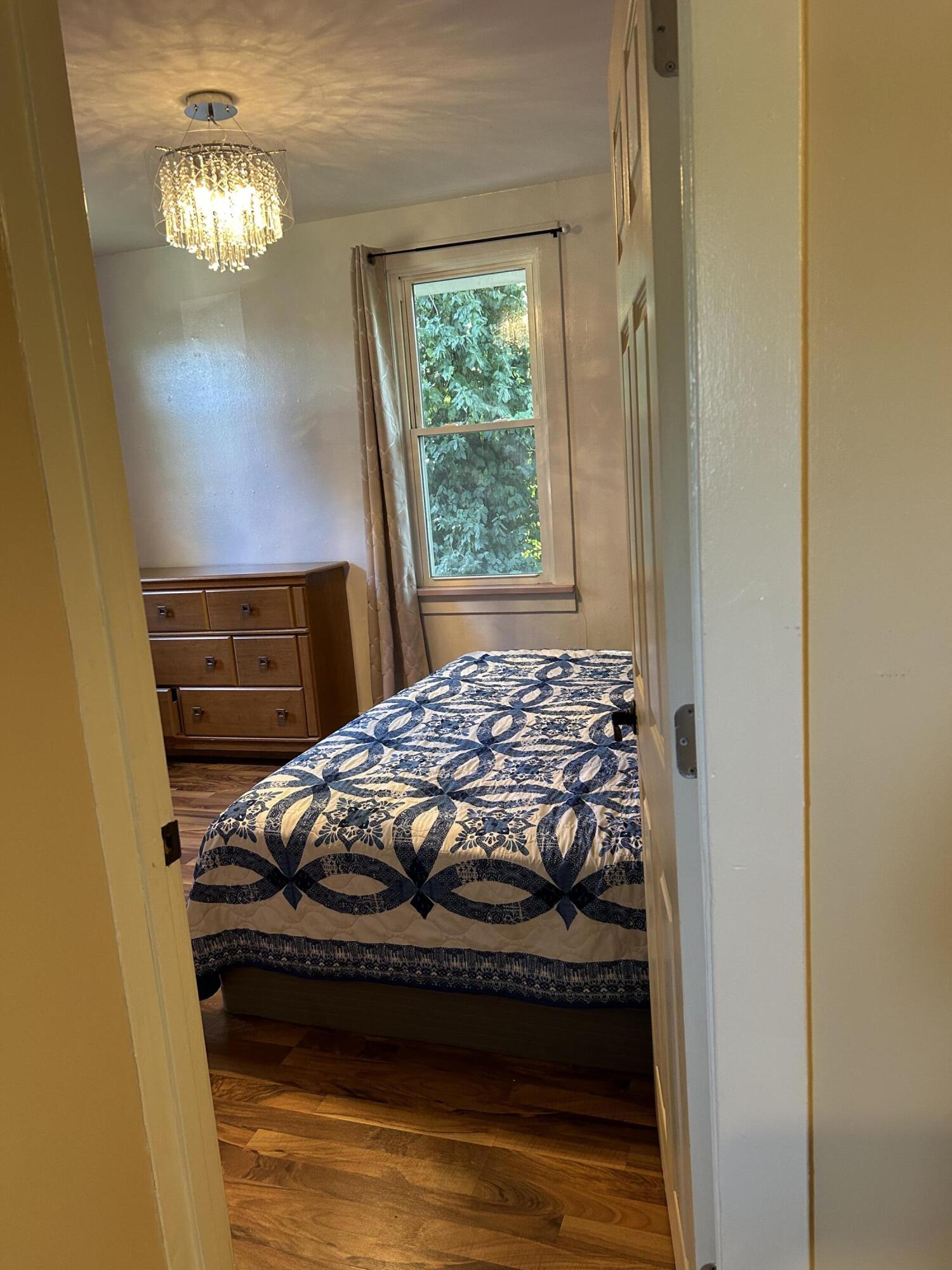 1038 Ridge Street Hammond, IN 46324 - Photo 10 of 31 a bedroom with a bed and a window