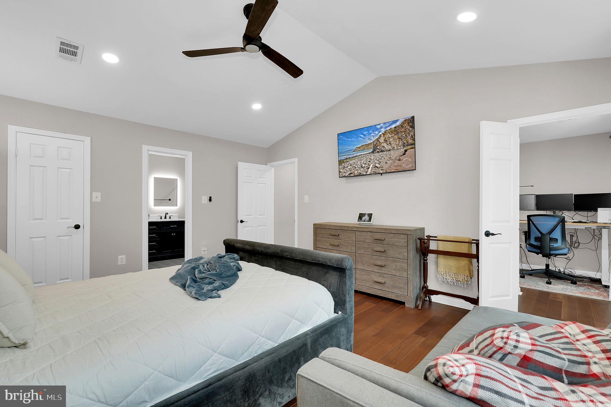 14901 Running Ridge Lane Silver Spring, MD 20906 - Photo 21 of 49 a bedroom with a bed and a couch