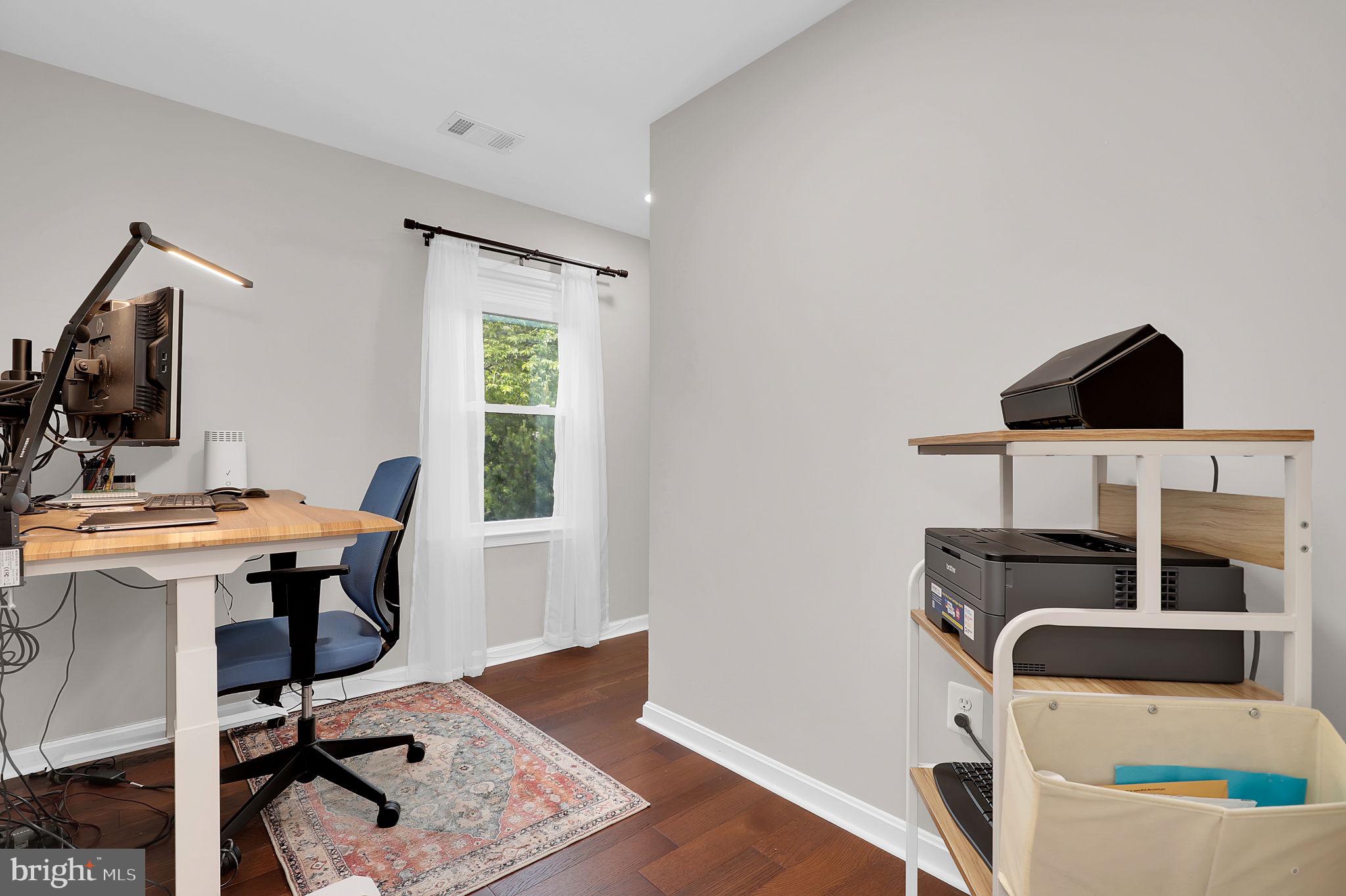 14901 Running Ridge Lane Silver Spring, MD 20906 - Photo 23 of 49 a view of workspace with wooden floor windows