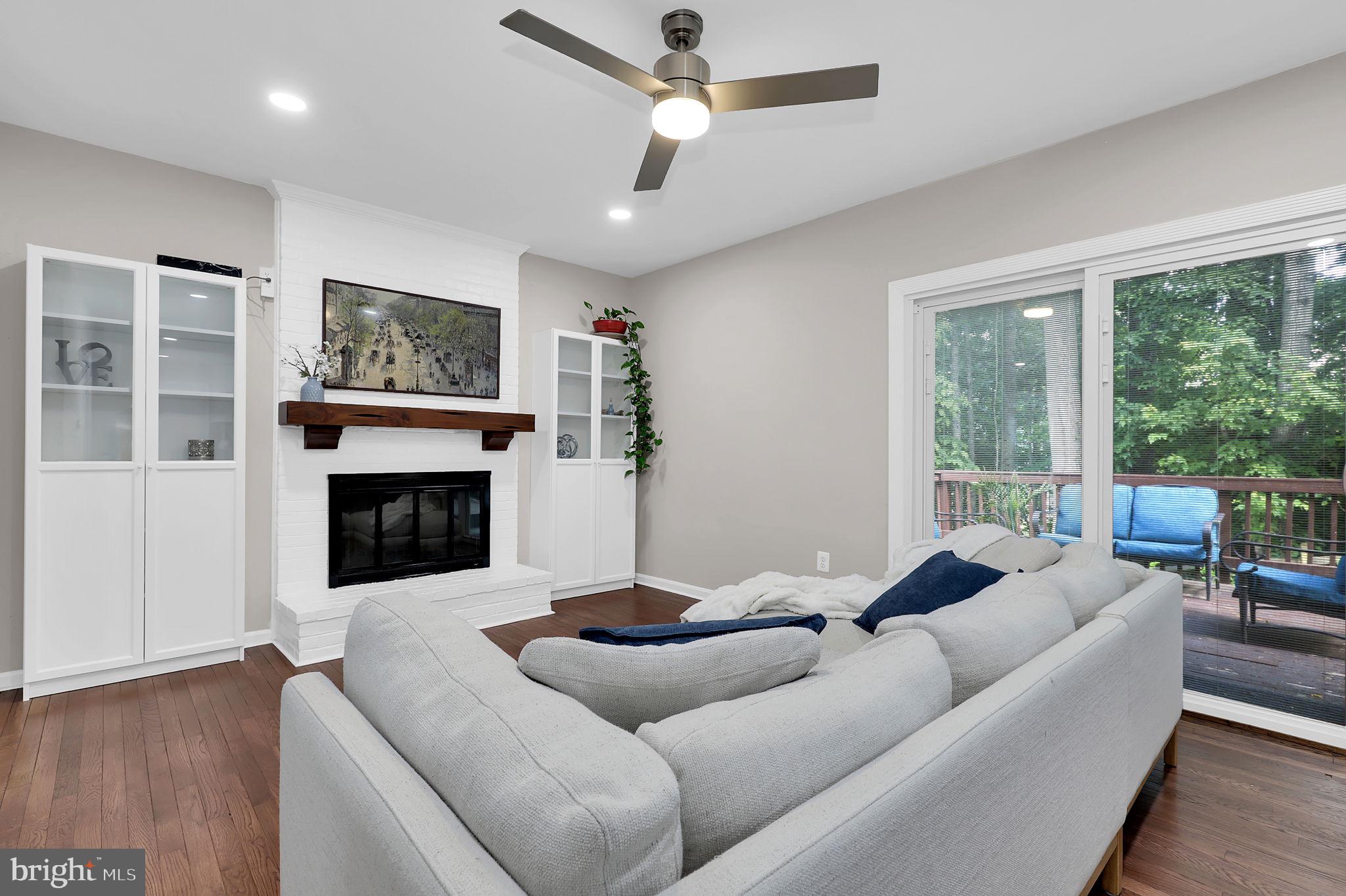 14901 Running Ridge Lane Silver Spring, MD 20906 - Photo 3 of 49 a living room with furniture and a fireplace