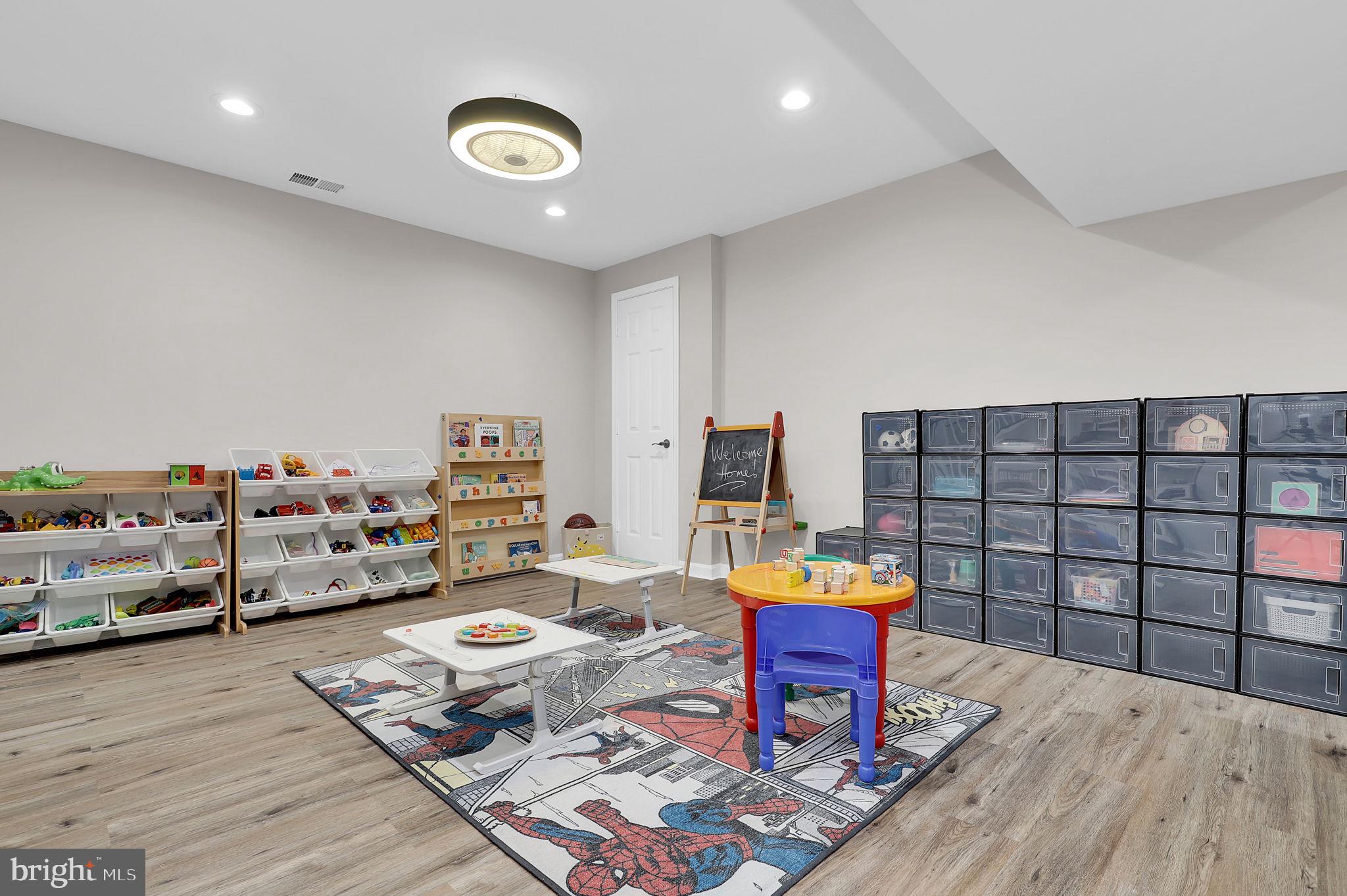 14901 Running Ridge Lane Silver Spring, MD 20906 - Photo 33 of 49 a living room with furniture and wooden floor