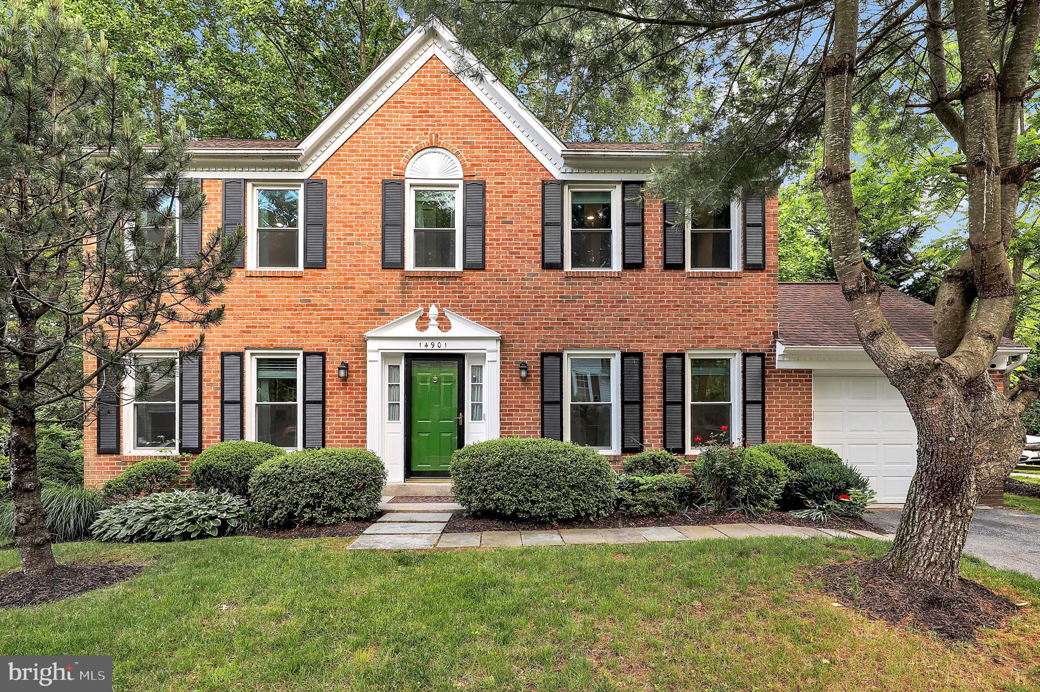 14901 Running Ridge Lane Silver Spring, MD 20906 - Photo 38 of 49 a front view of a house with a yard