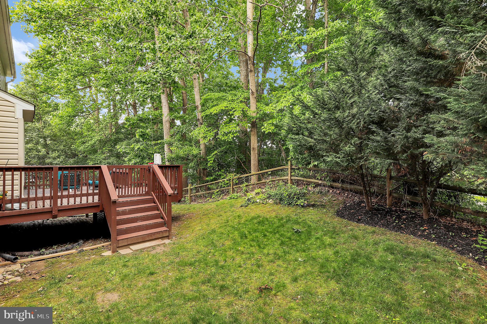 14901 Running Ridge Lane Silver Spring, MD 20906 - Photo 40 of 49 a view of green field with sitting area